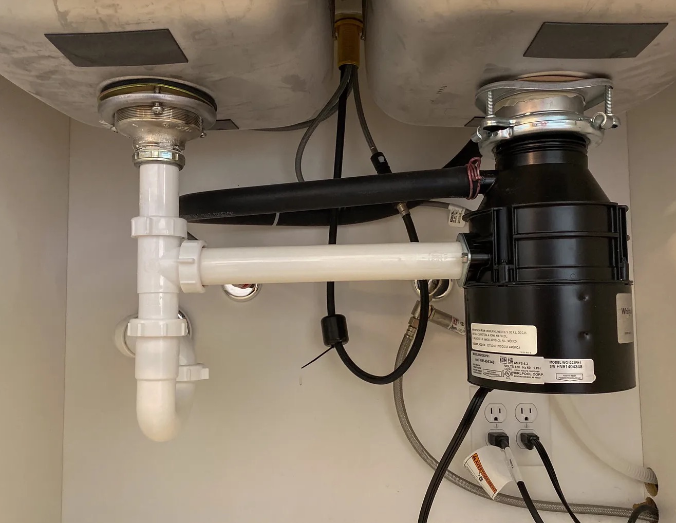 Leaky Garbage Disposal Cleanup in Long Island, NY